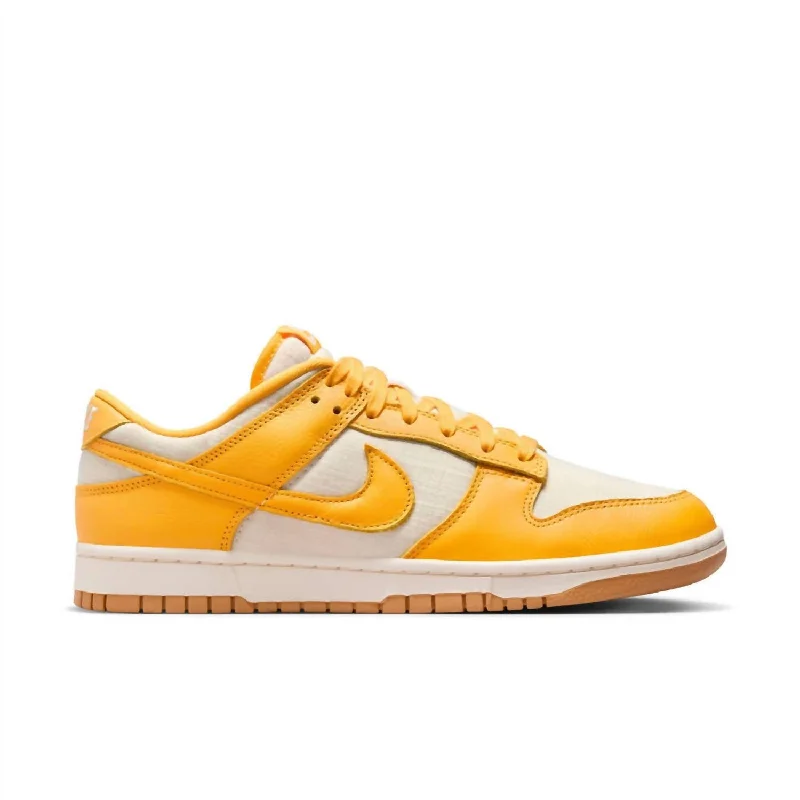 Men's Dunk Low Retro Premium Sneaker In University Gold/coconut Milk/gum Light Brown